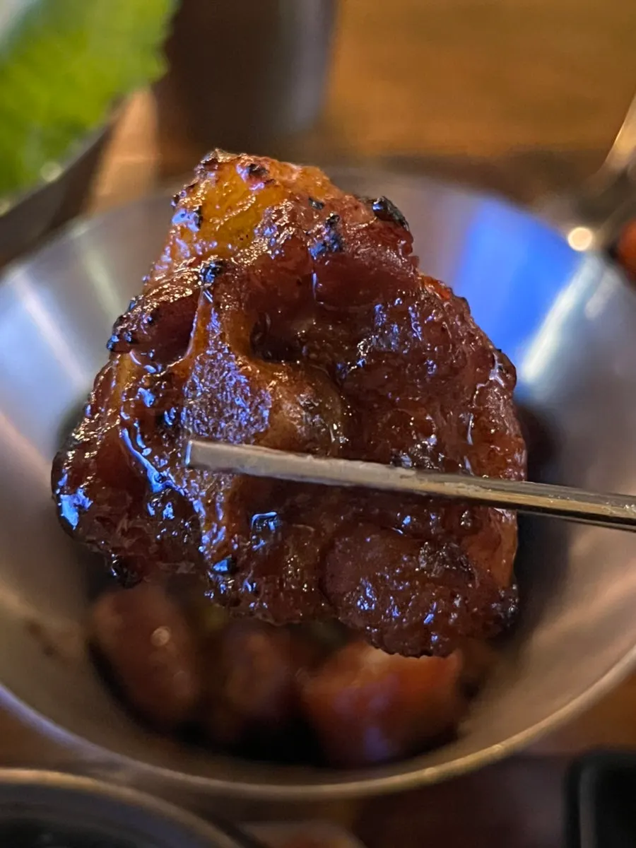 Spicy pork tail received from the review event