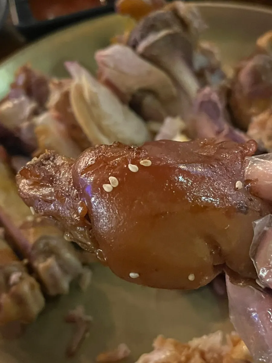 Plate of picked-clean spicy pork tail