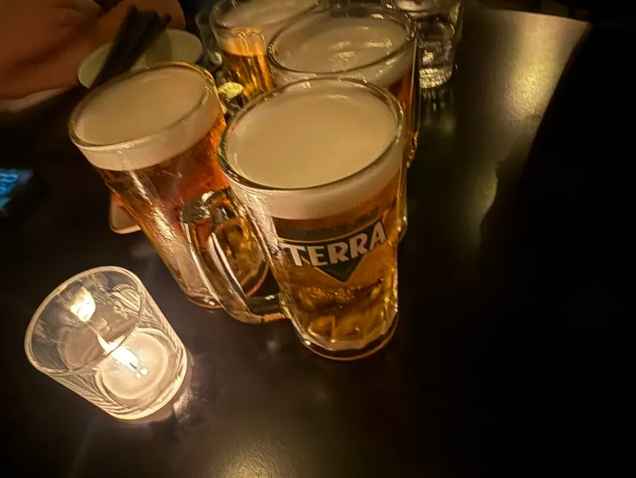 Table with four glasses of 500ml draft beer