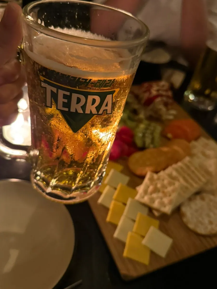 Drinks and food under dim lighting
