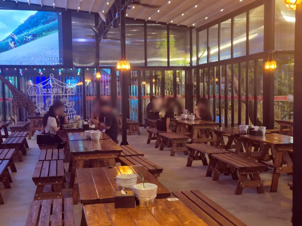 Wide, high-ceilinged outdoor hall at Kkoko Land