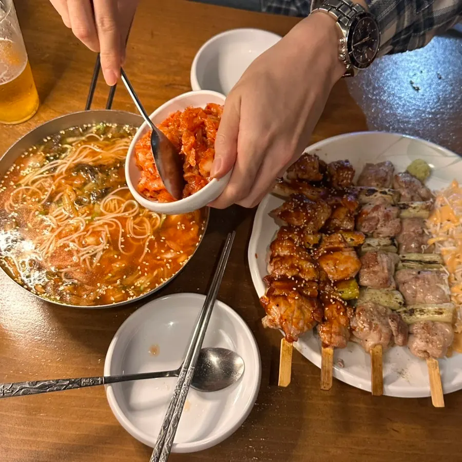 Close-up of noodles and kimchi in the soup