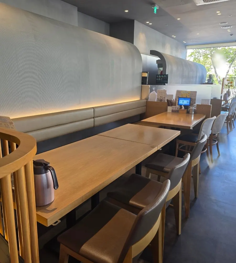 Seating area with wood-toned tables