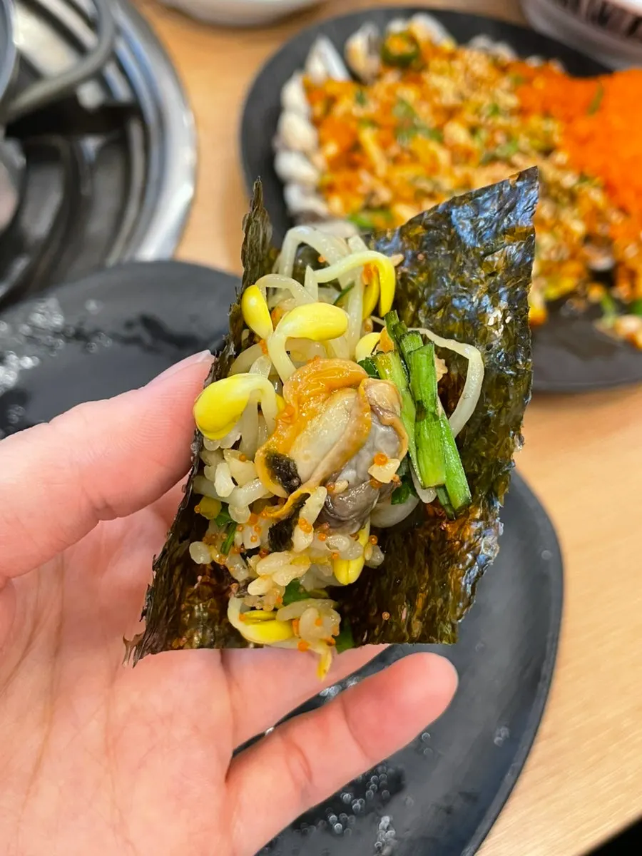Soy sauce cockle bibimbap loaded with cockles