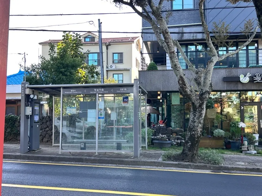 Bus stop in front of the Kkotdam Sushi building