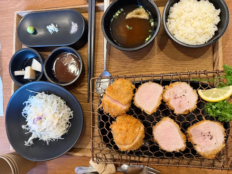 A full spread of Kkot Gatsu pork cutlet dishes served 10 minutes after ordering