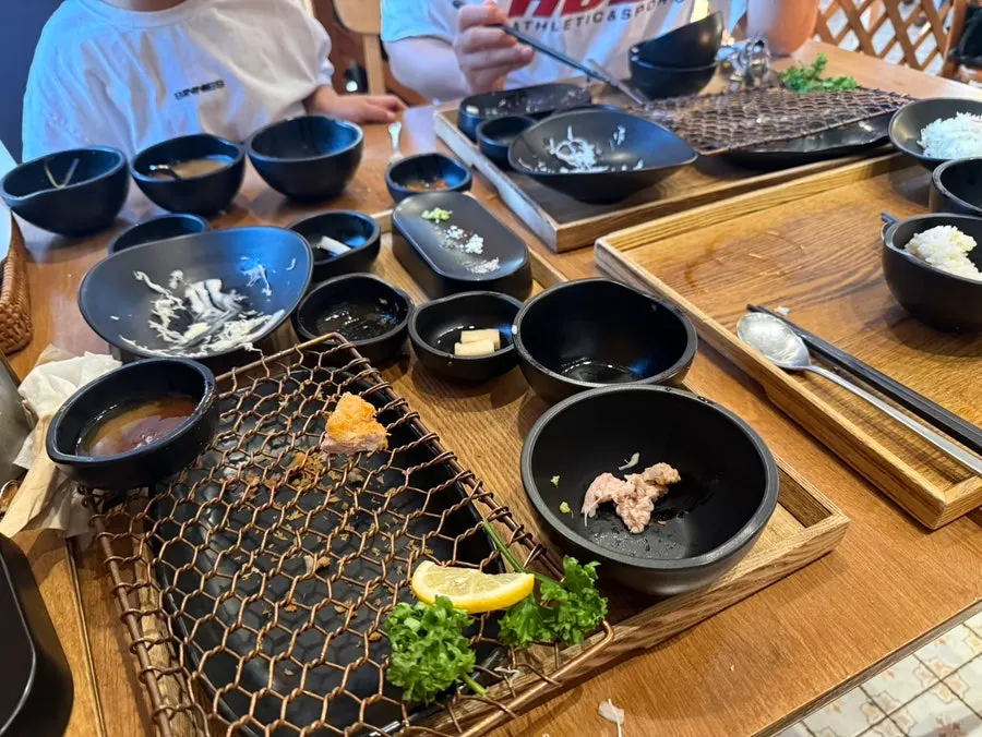 A nearly emptied plate of Kkot Gatsu cutlet