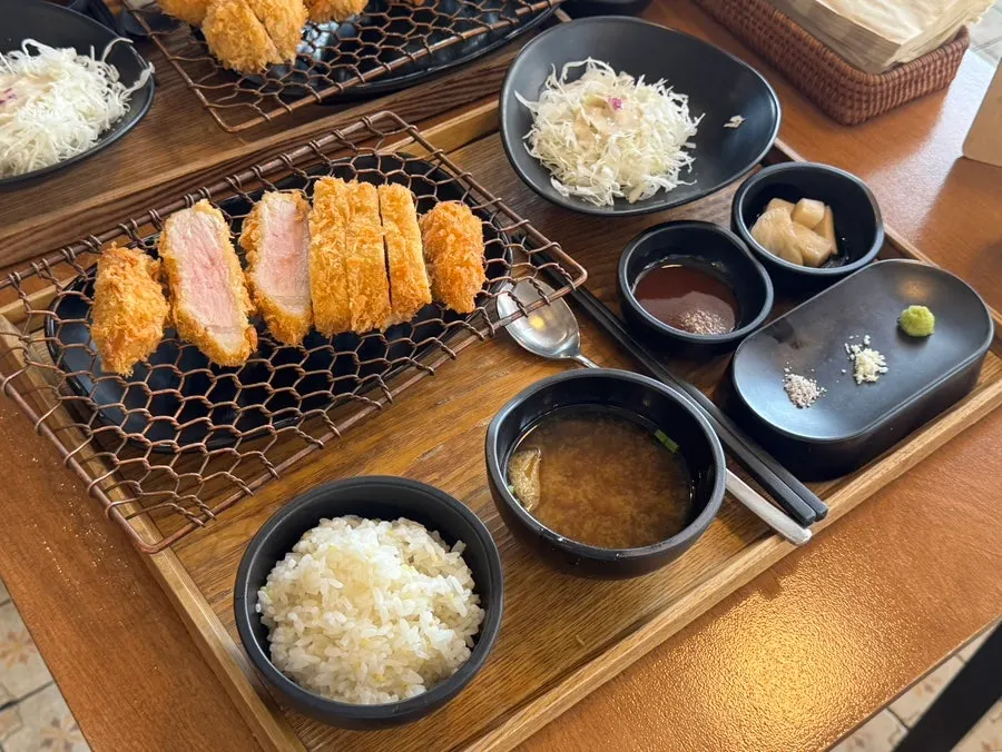 Cutlet meal with rice, cabbage salad, and miso soup
