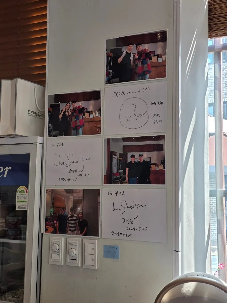 Celebrity visit photos and signatures on the wall