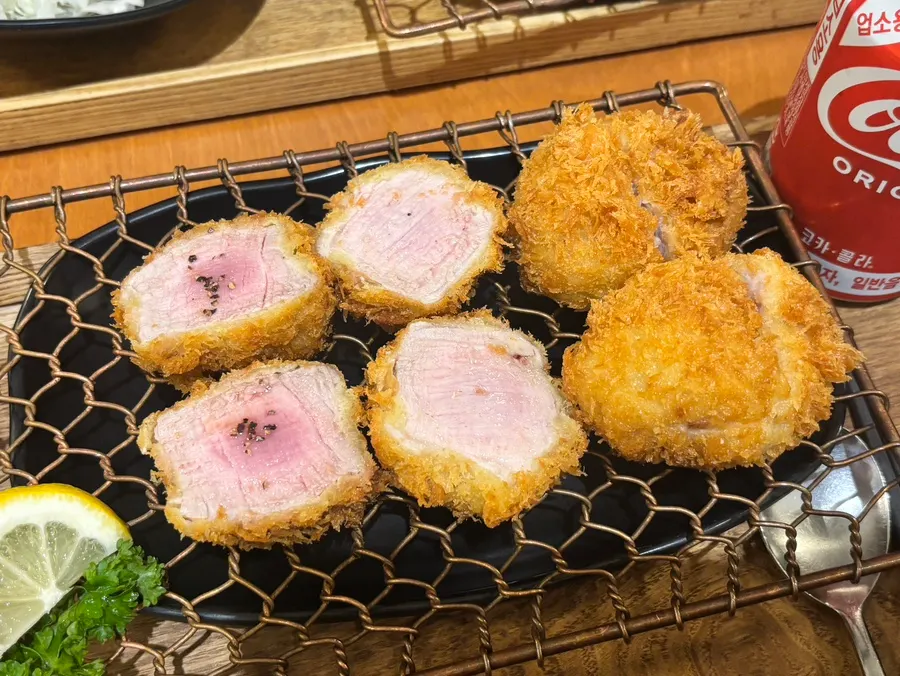 Cross-section of the Kkot Gatsu tenderloin cutlet showing its bright pink color