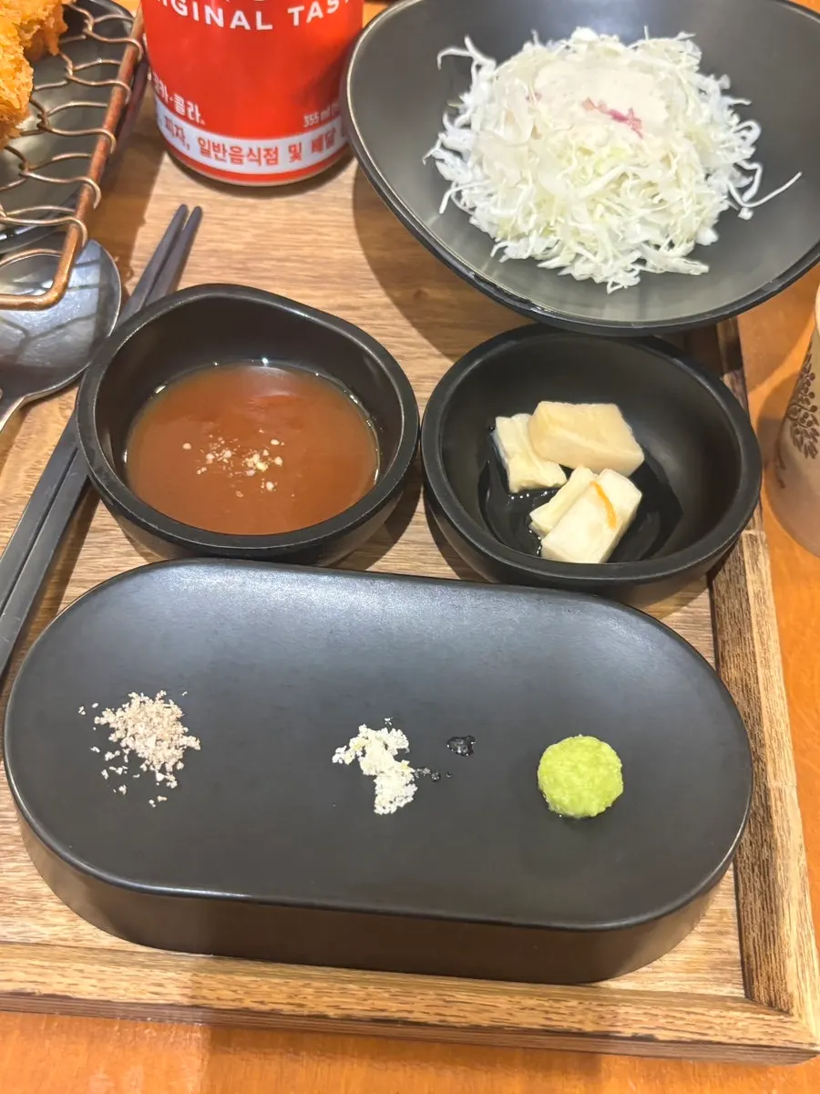 Plate with lemon salt, truffle salt, and wasabi