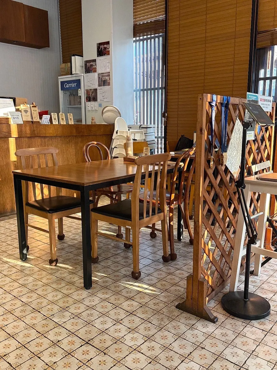 Wood-toned seating inside Kkot Gatsu