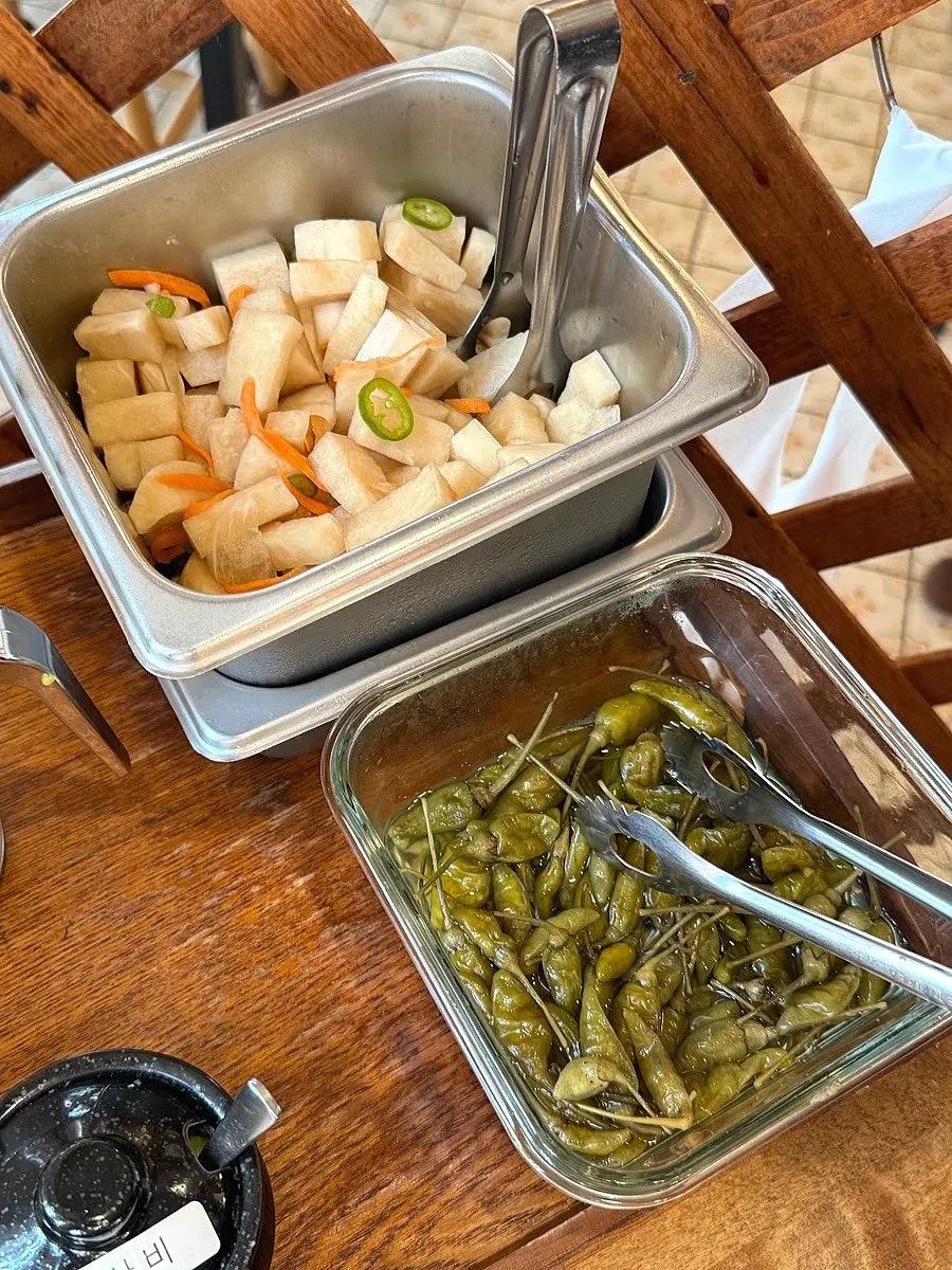 Cumin salt, lemon salt, wasabi, and truffle oil sauces on display