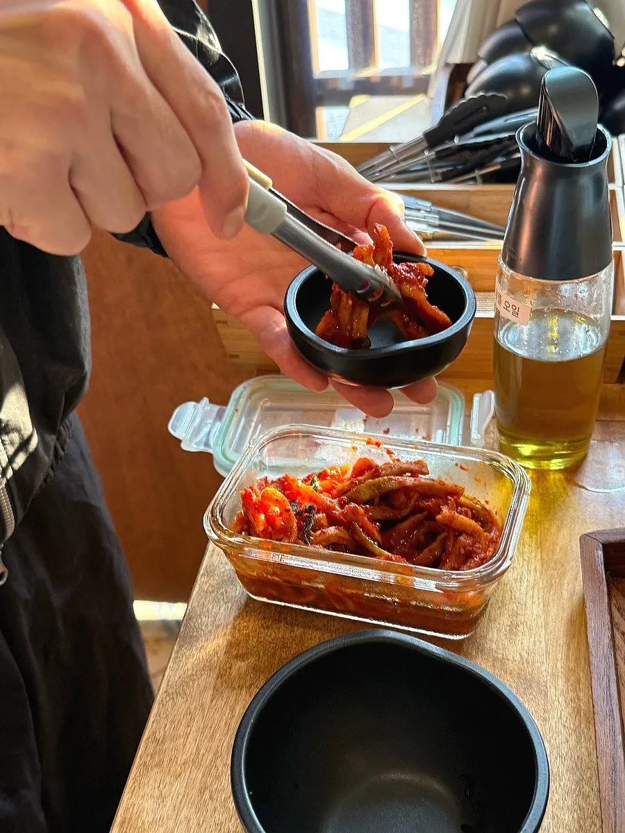 Pork cutlet sauces set out at the self-serve bar