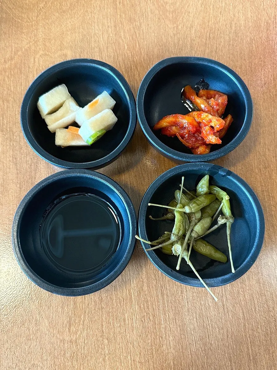 Pickled radish, mountain pepper, and dried radish kimchi side dishes