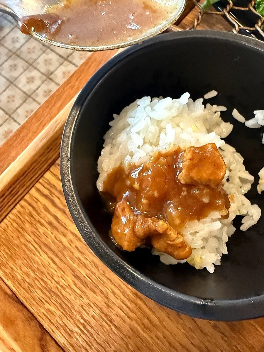 Pork cutlet served with a bowl of rice