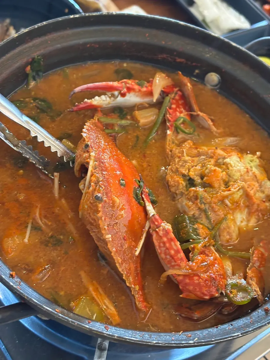 Umami-rich broth of the crab stew