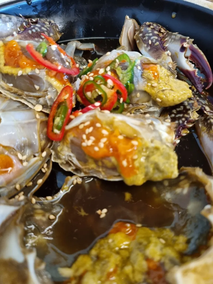 Soy-marinated crab meat placed on rice