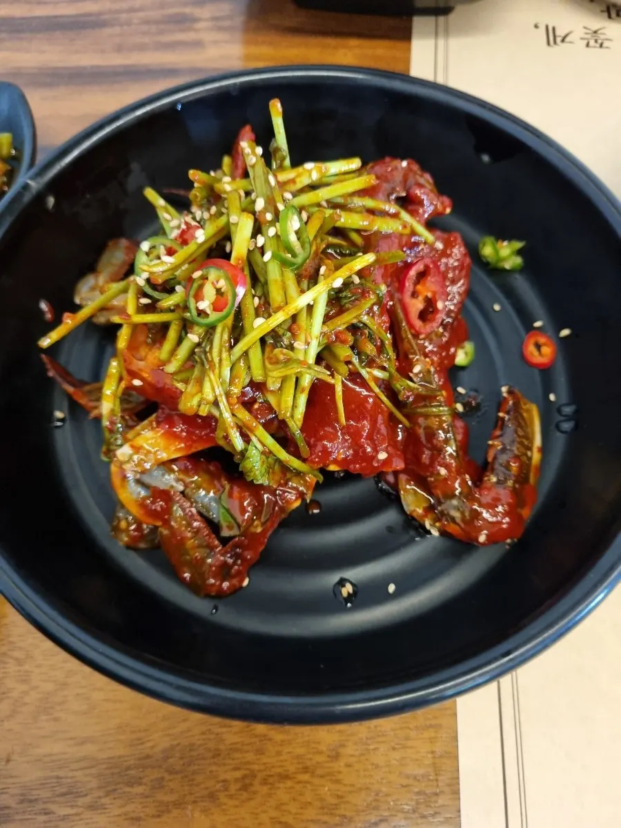 A plate of spicy-sweet seasoned crab