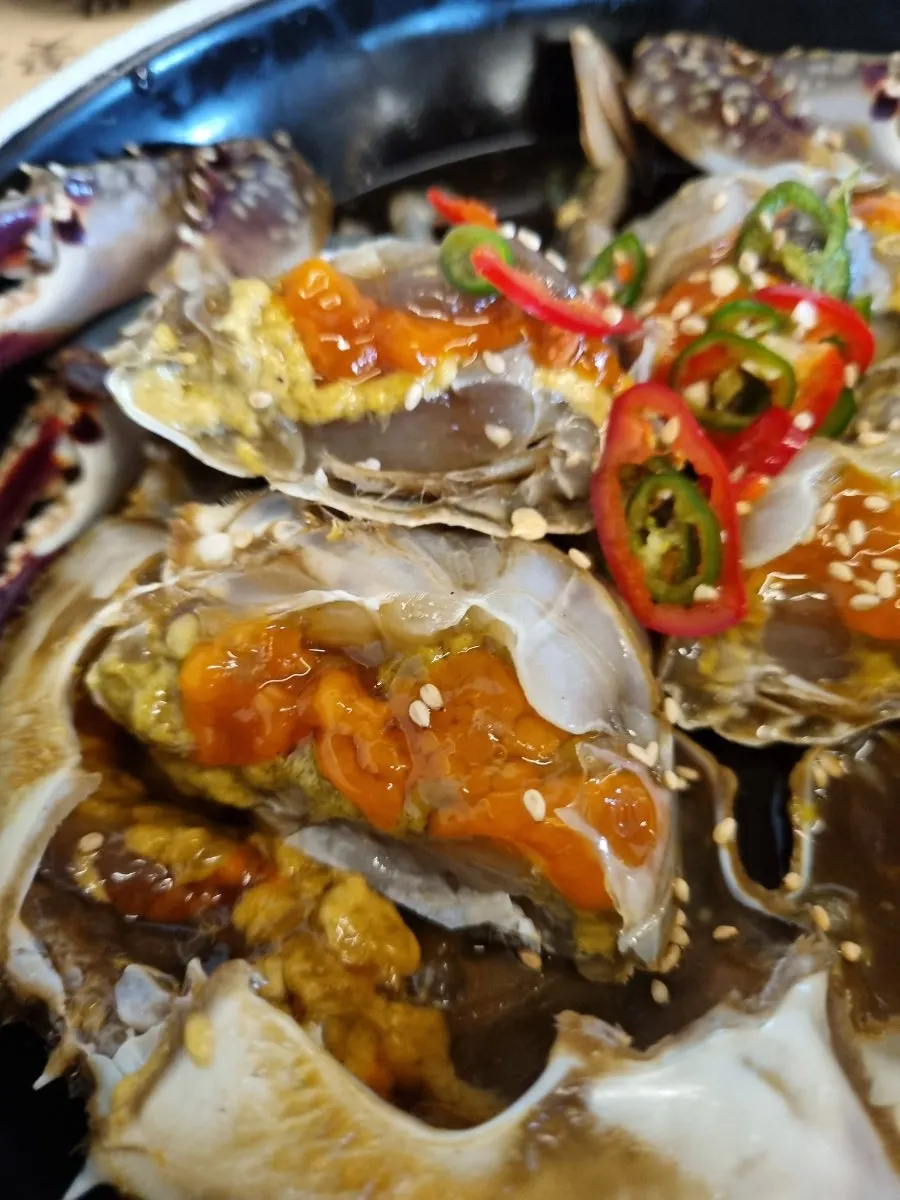 Soy crab and seasoned crab served half and half