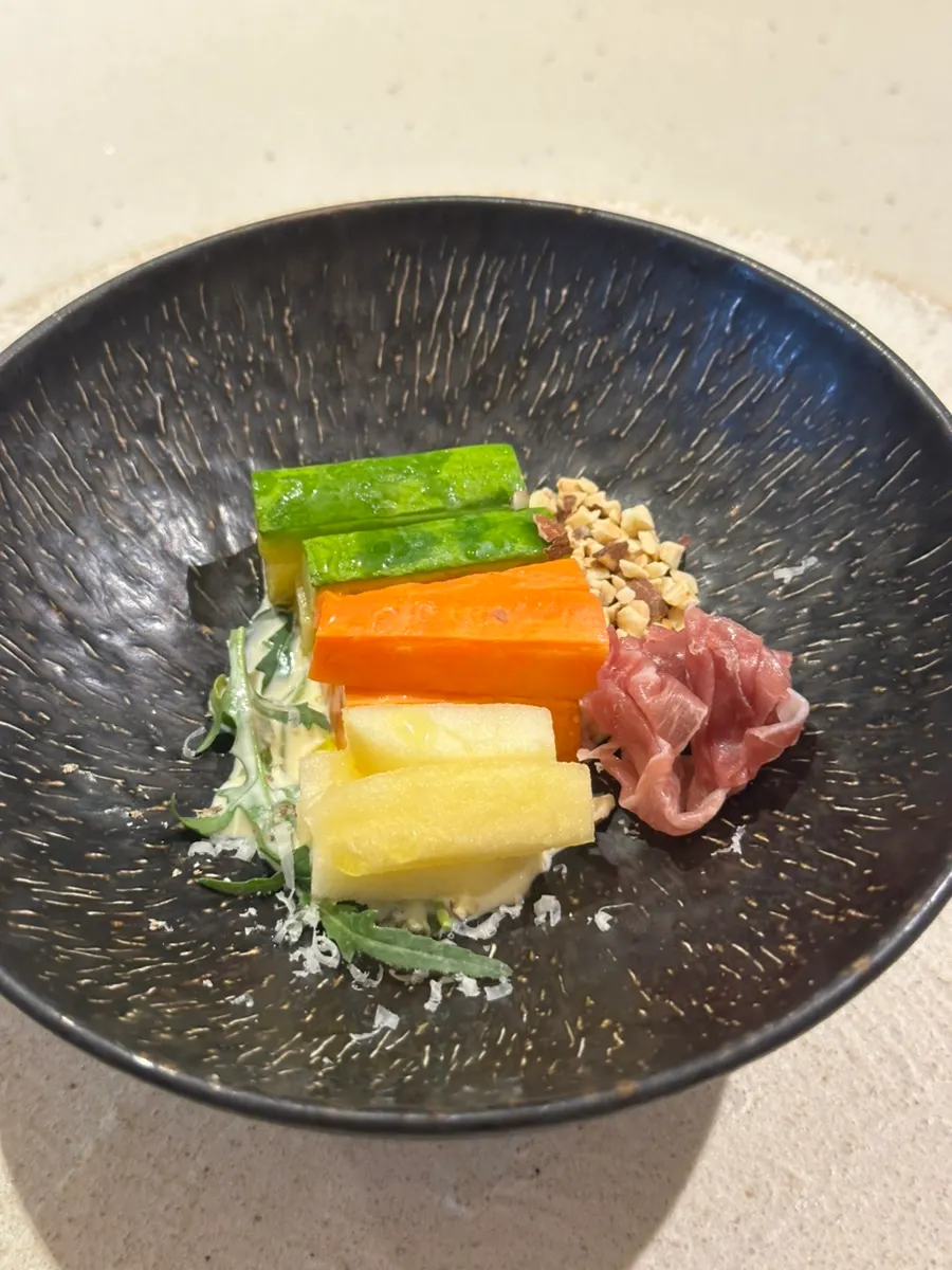 Grilled vegetable salad with prosciutto