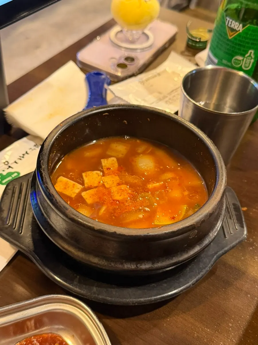 Pork belly wrap piled high with minari