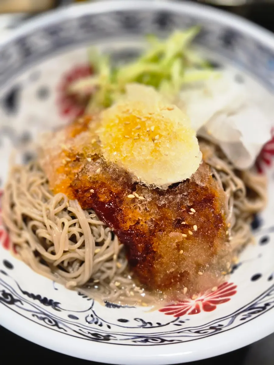 Freshly mixed bibim mak-guksu noodles