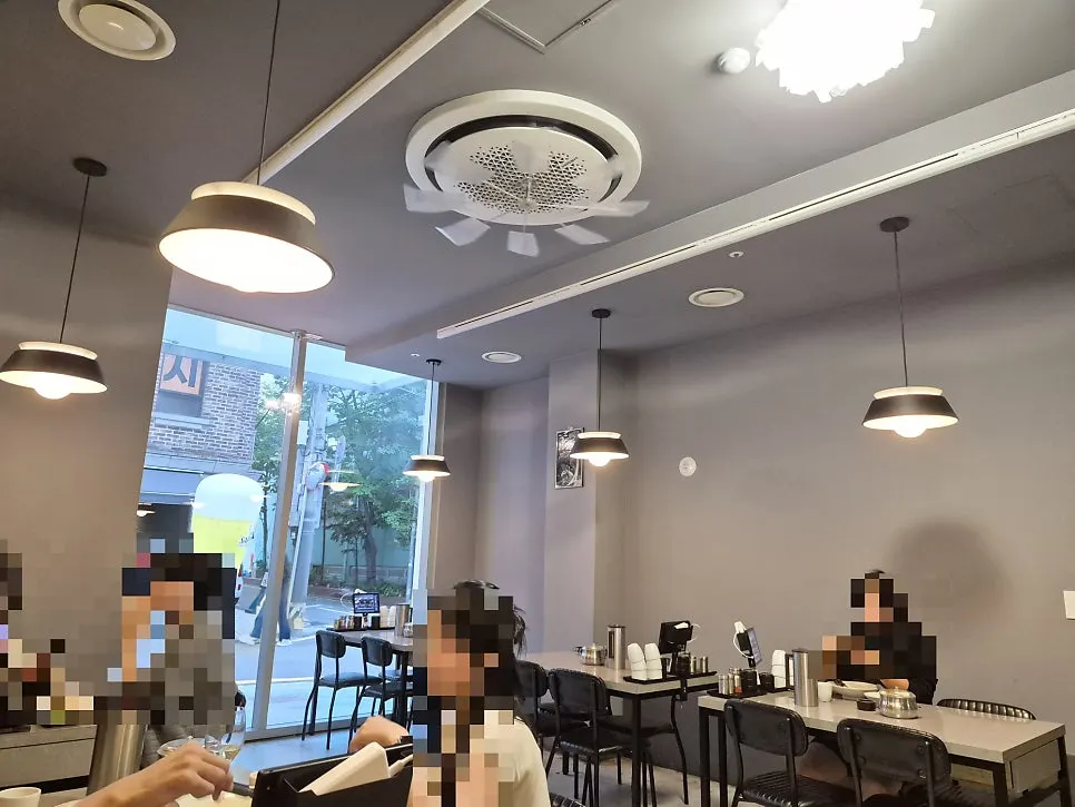 Modern, clean interior of Kkuudeok Seolleung Main Branch