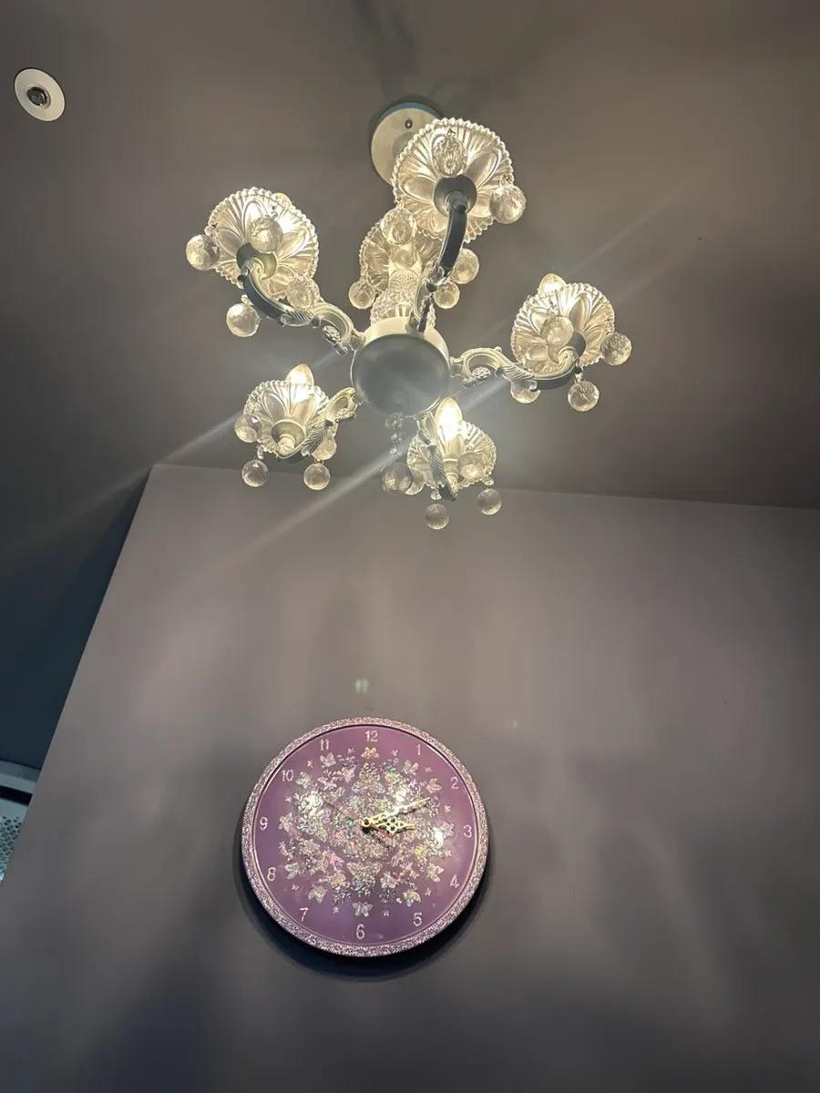 Interior of Kkuudeok with chandelier lighting