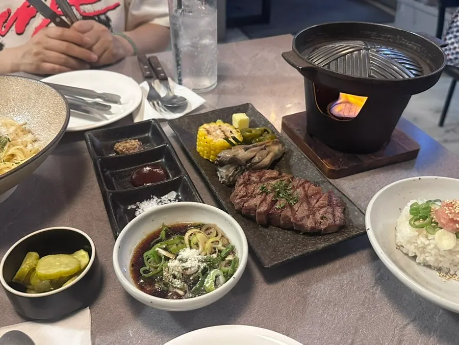 Five sauces served with the steak