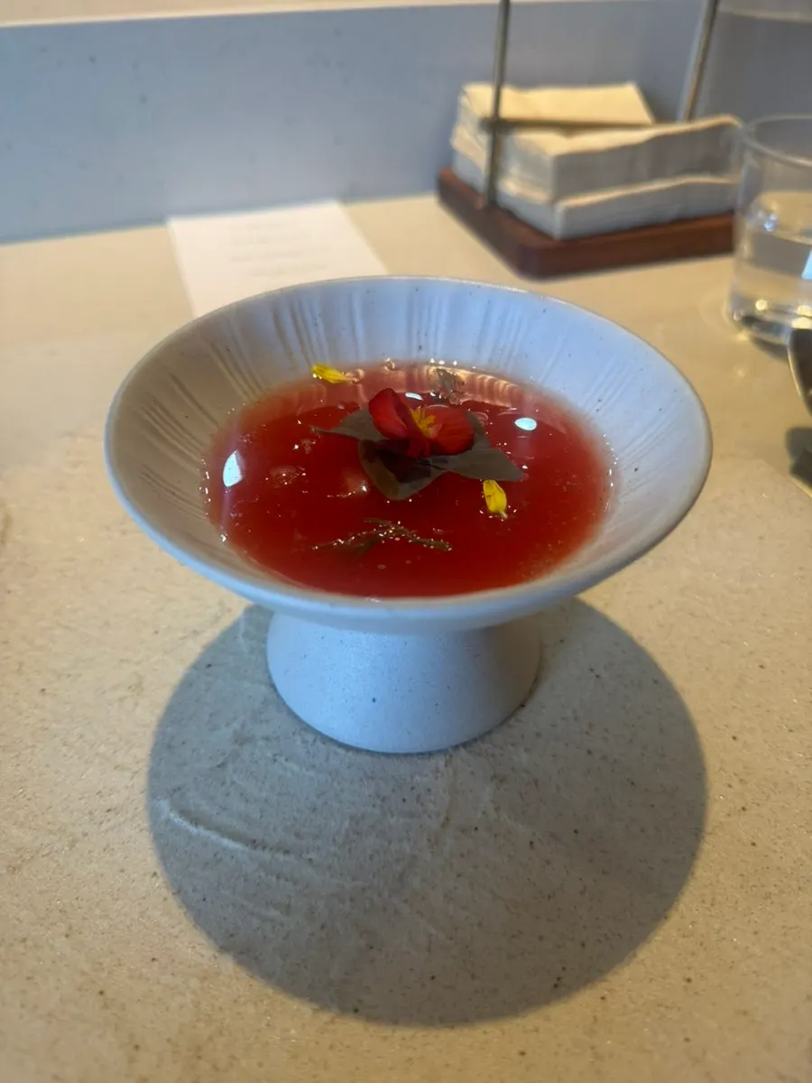 Close-up of watermelon gazpacho with squid
