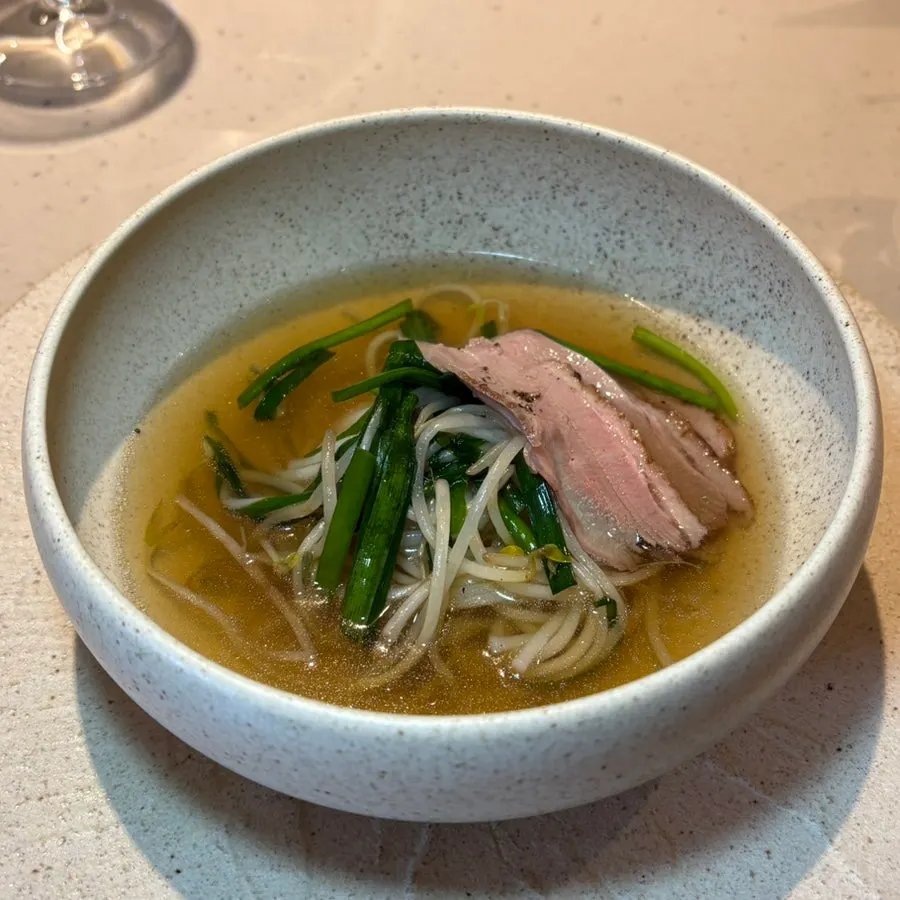 Eel donburi topped with eel, Korean melon, and burdock root