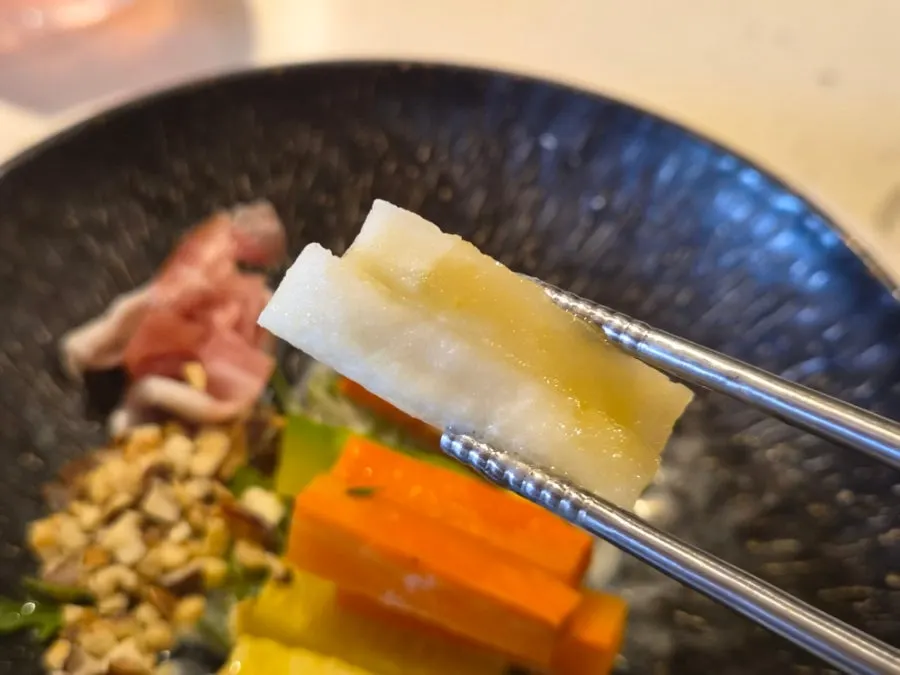 Grilled vegetable salad wrapped in prosciutto