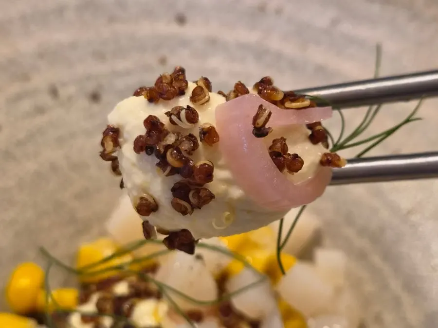 Sweet corn custard topped with scallop and shallot