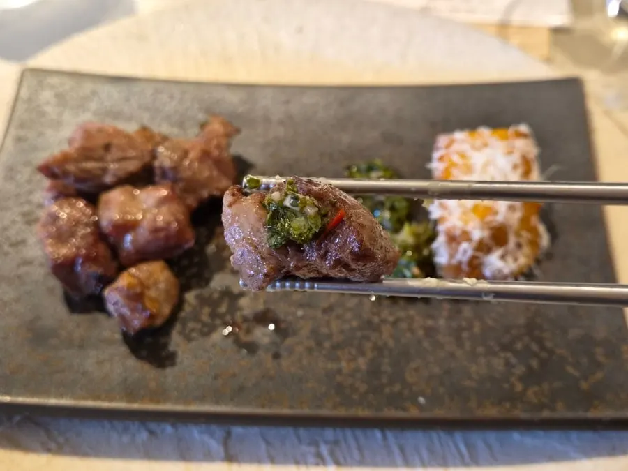 Iberico served with chimichurri herb sauce