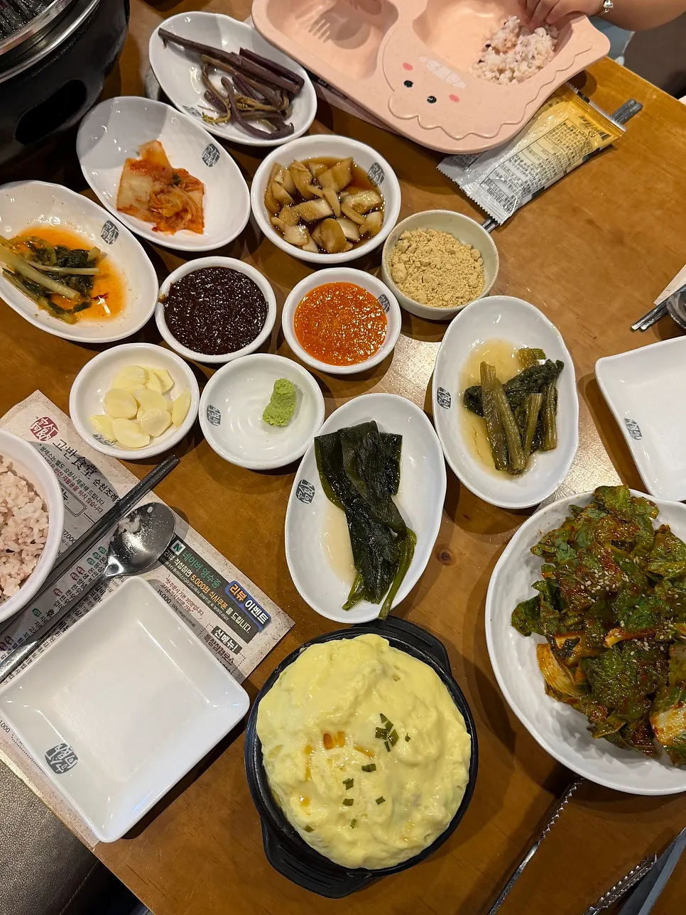 Table spread of side dishes at Goban Sikdang