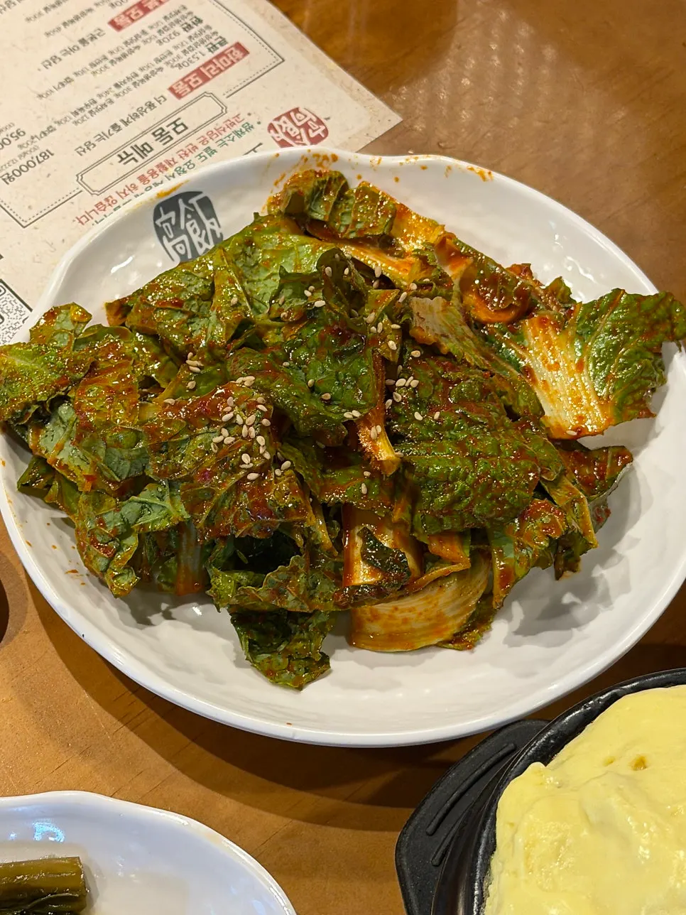 Steamed egg served alongside fresh cabbage salad