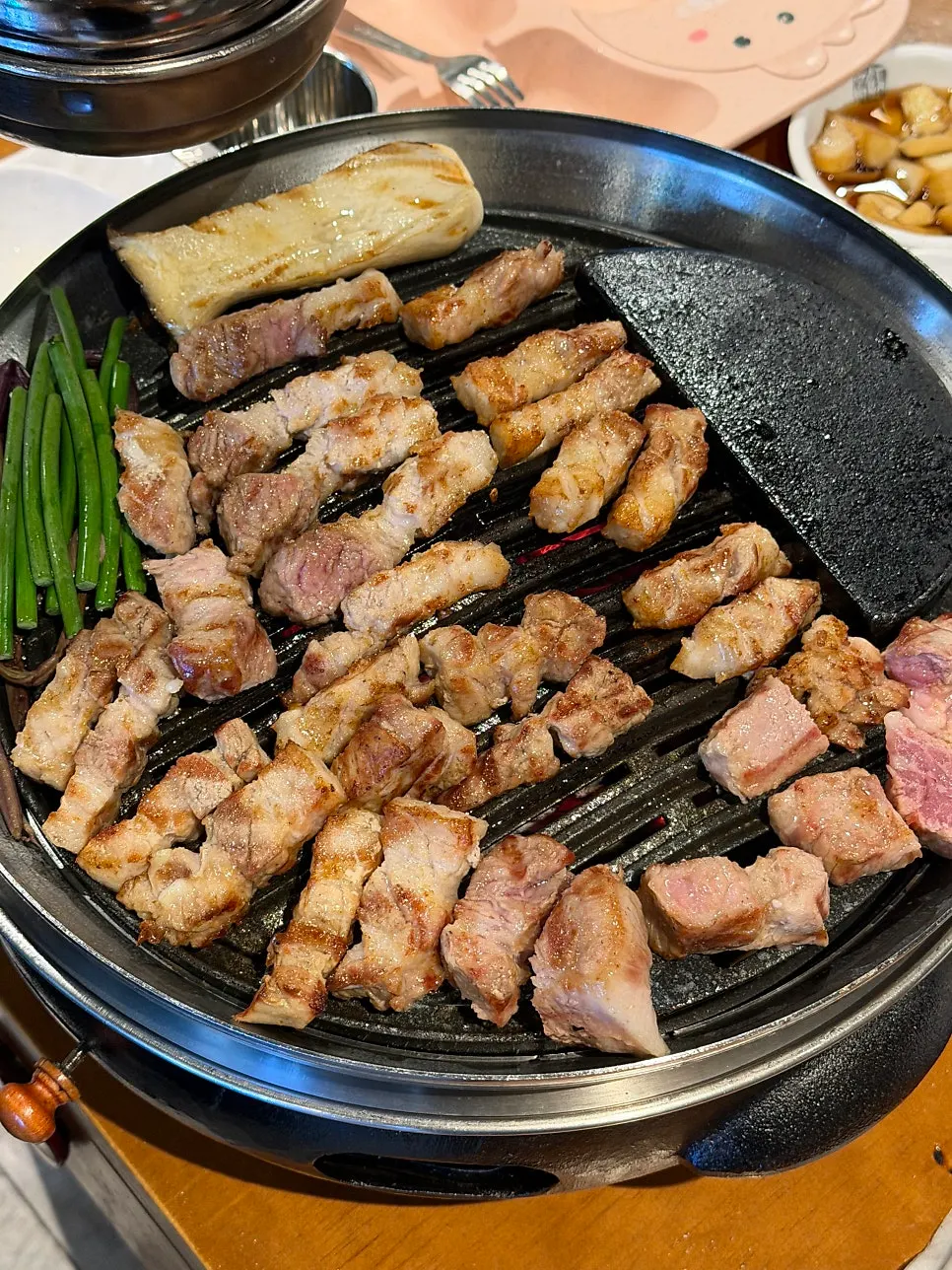 Golden, well-grilled aged pork belly