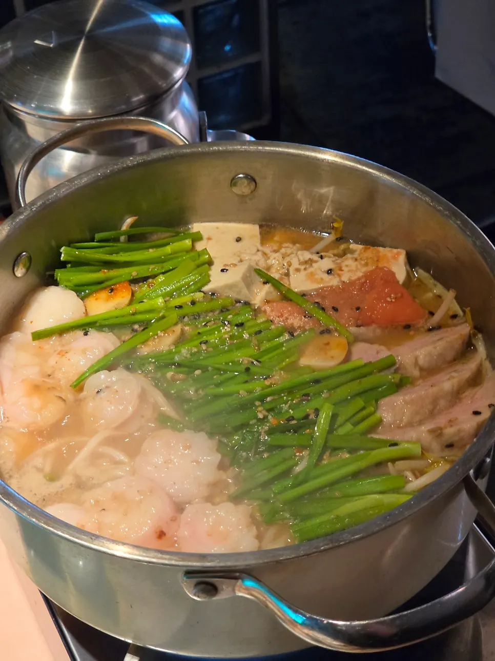 Motsunabe starting to bubble as it cooks