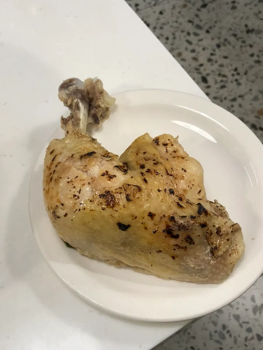 Chicken drumstick ramen with a whole large drumstick on top
