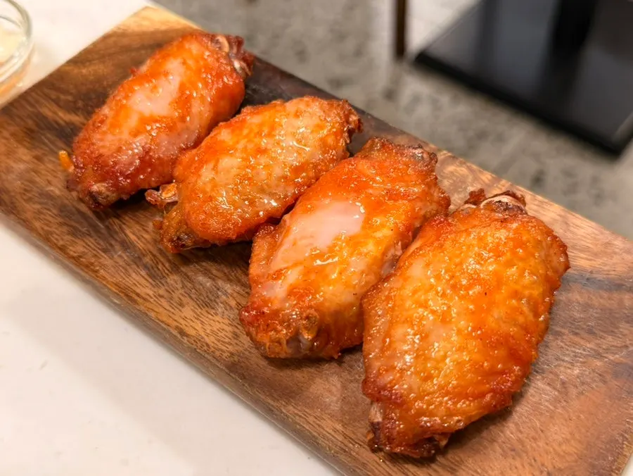 A plate of Cocker Noodle Two's fried chicken wings