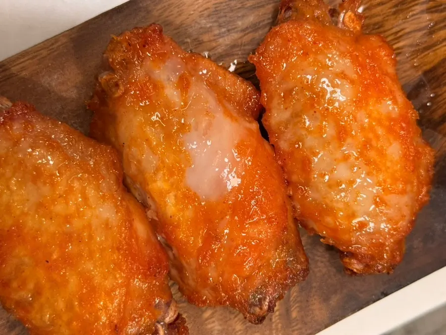Close-up of juicy fried chicken wings