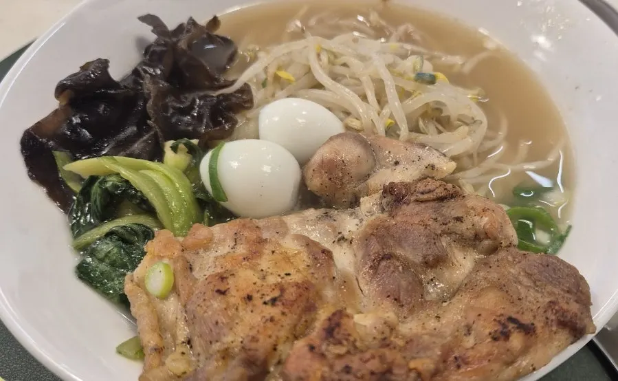Chicken steak ramen topped with chicken steak and vegetables