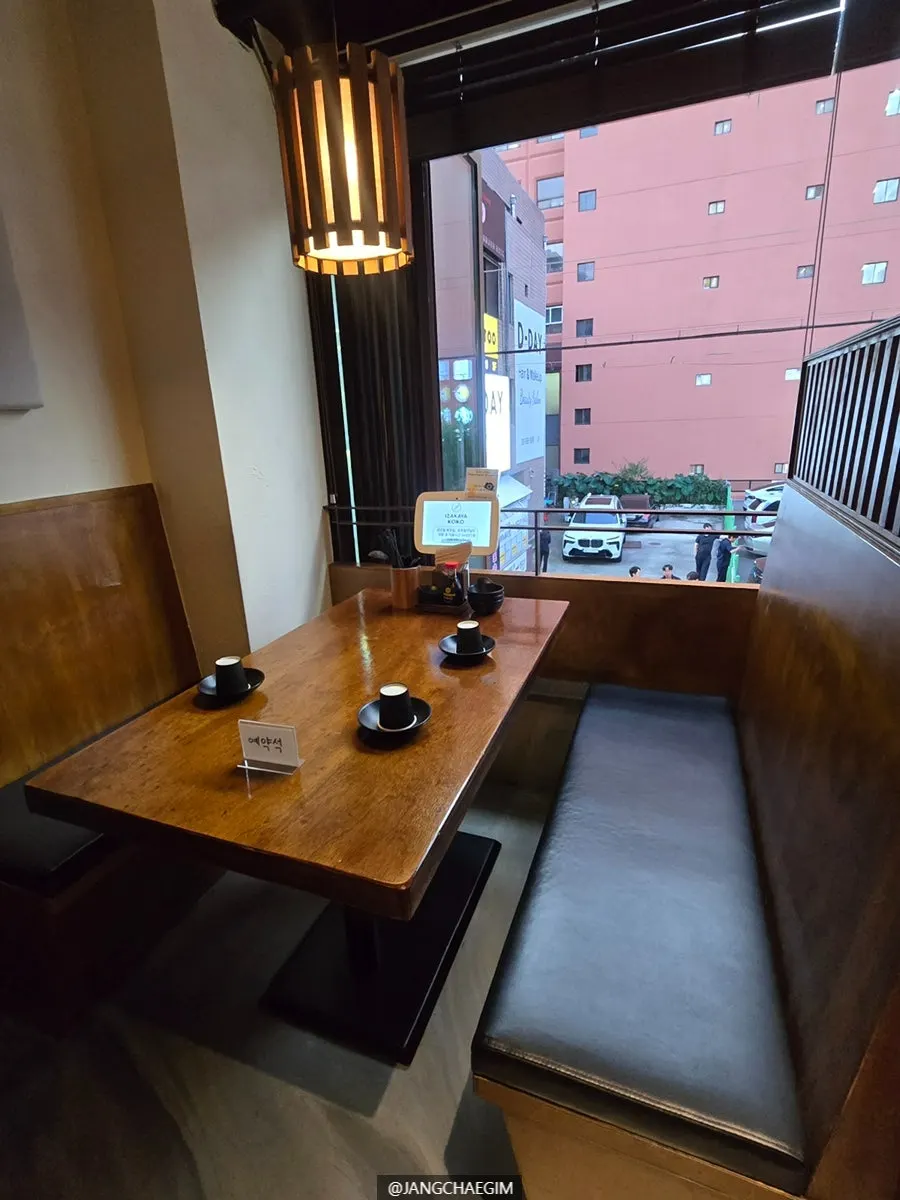 2nd-floor window terrace seating at Izakaya Goko
