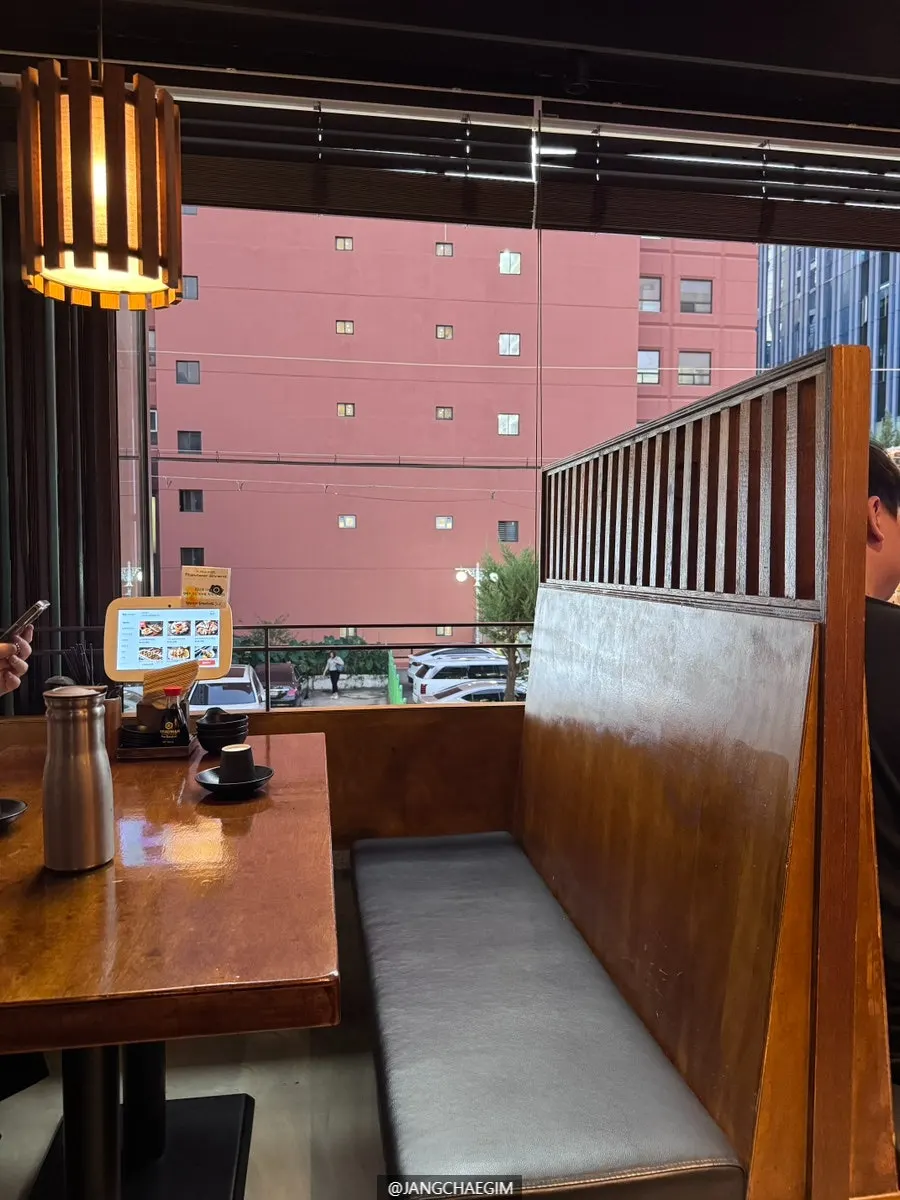 Window seats at Izakaya Goko with the window open