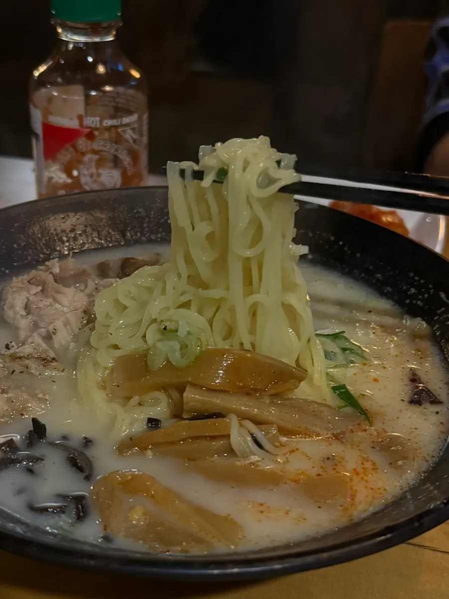 Table set with the sashimi cake and tori ramen