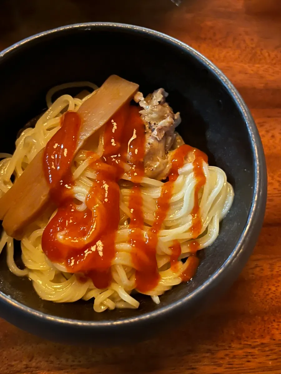 Noodles lifted from the tori paitan bowl
