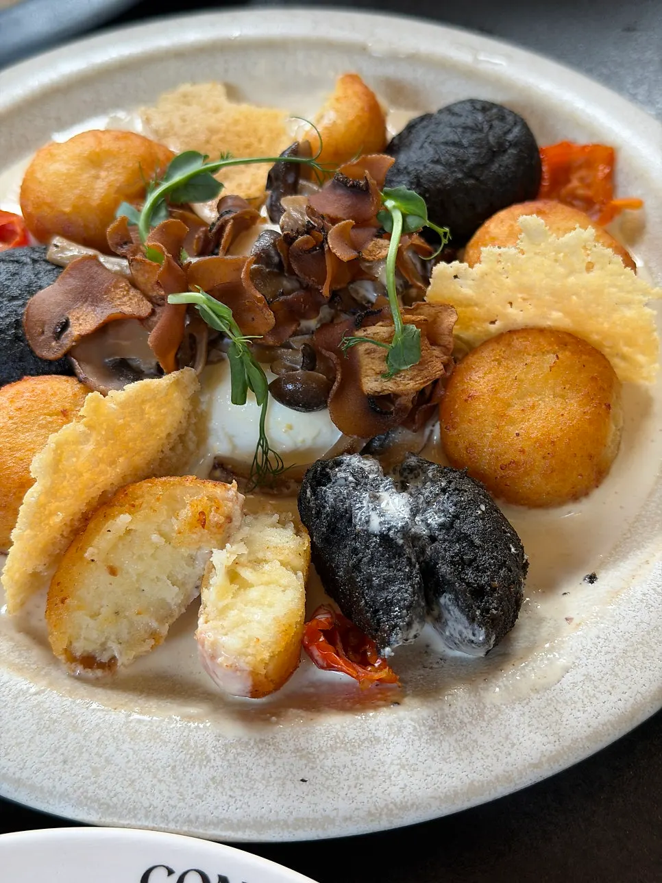 Potato gnocchi with the egg yolk broken open