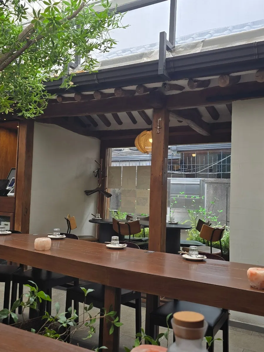 Interior of Concasse Anguk with a tree in the middle