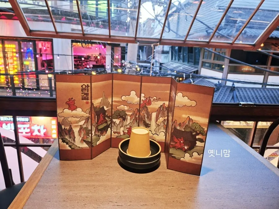 Seating at Ari Valley Konkuk with an old-tavern feel